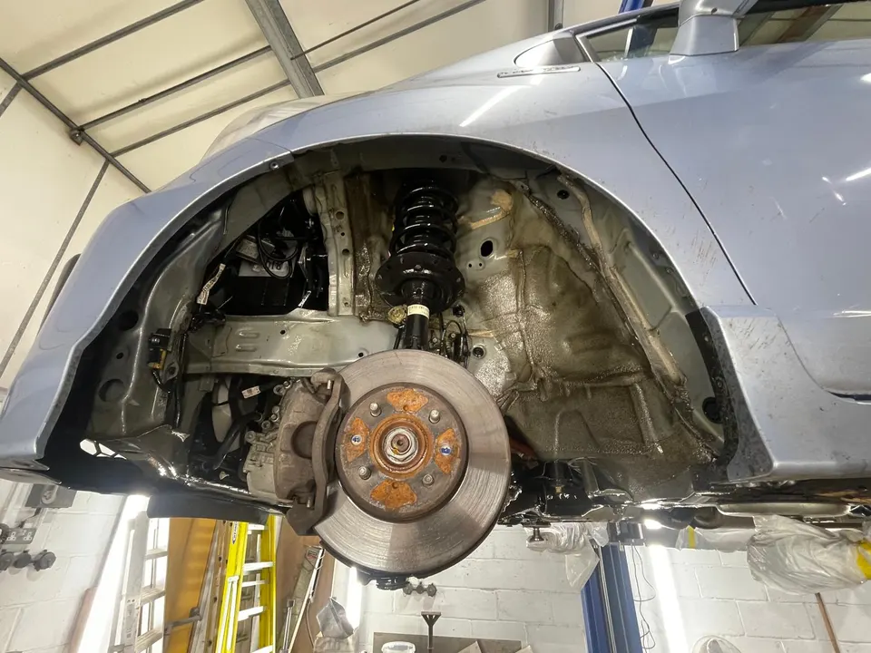 Front wheel arch with the liner removed